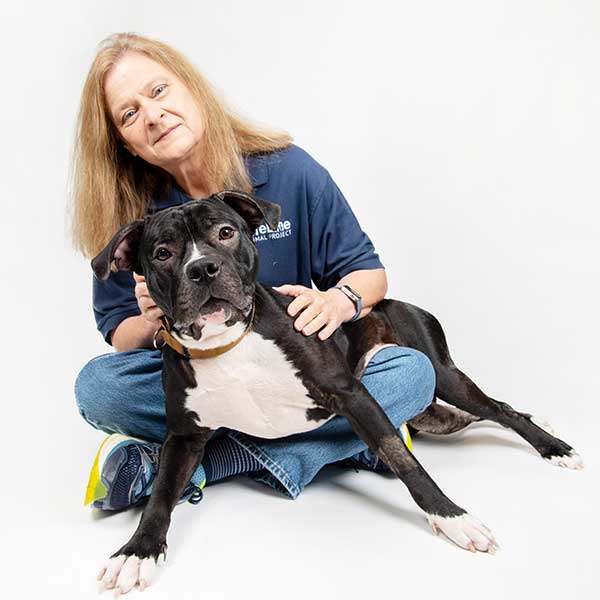 LifeLine CEO, Rebecca Guinn with a shelter dog